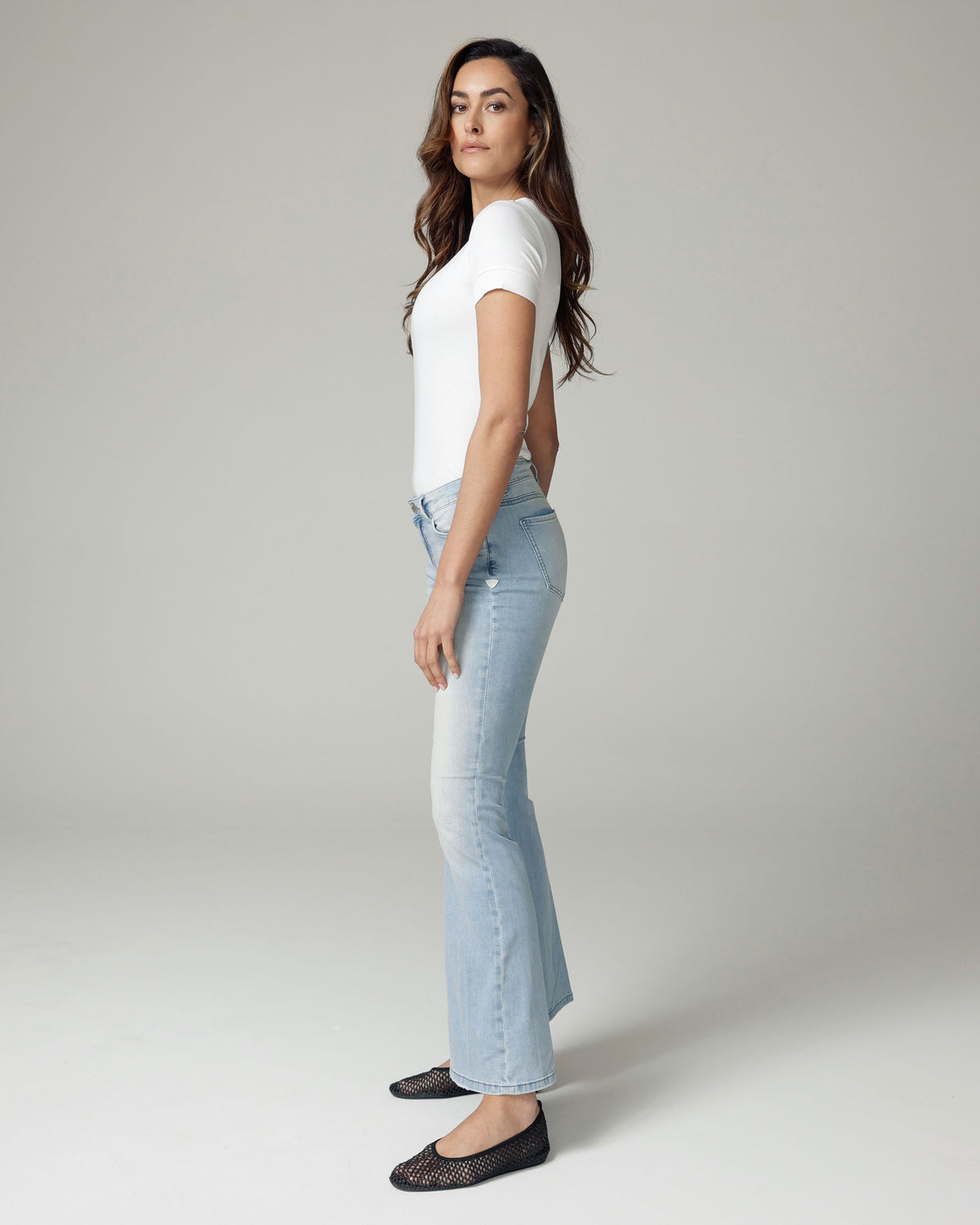 Bleached Blue Flare High-Rise Jeans, The Belly, side view